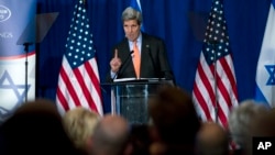 ລັດຖະມົນຕີການຕ່າງປະເທດ ສະຫະລັດ ທ່ານ John Kerry ກ່າວຄຳປາໄສ ໃນກອງປະຊຸມ Saban ທີ່ນະຄອນຫຼວງ ວໍຊິງຕັນ. 7 ທັນວາ, 2014.