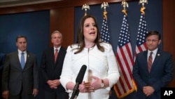 Rep. Elise Stefanik, R-N.Y., speaks to reporters at the Capitol in Washington, May 14, 2021, just after she was elected the new chair of the House Republican Conference.