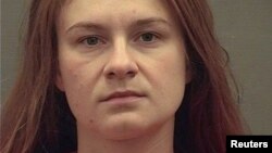 FILE - Maria Butina appears in a police booking photograph released by the Alexandria Sheriff's Office in Alexandria, Virginia, Aug. 18, 2018.