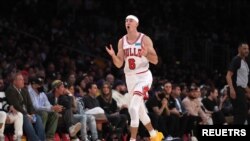 Nov 15, 2021; Los Angeles, California, USA; Chicago Bulls guard Alex Caruso (6) celebrates against the Los Angeles Lakers in the second half at Staples Center. The Bulls defeated the Lakers 121-103. Mandatory Credit: Kirby Lee-USA TODAY Sports