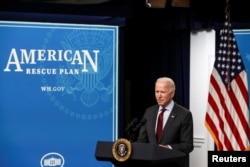 U.S. President Joe Biden announces changes to the main U.S. coronavirus disease (COVID-19) aid program for small businesses during brief remarks in the South Court Auditorium at the White House in Washington, U.S., February 22, 2021. REUTERS