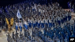 南北韓運動員在半島旗帶領下一起步入2018年雅加達亞運會開幕會場