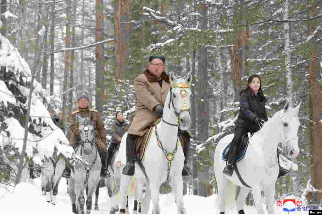 North Korean leader Kim Jong Un rides a horse as he visits battle sites in areas of Mt Paektu, Ryanggang, in this undated picture released by North Korea&#39;s Central News Agency (KCNA).