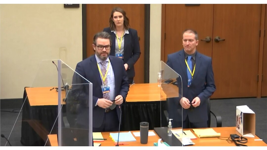 In this image taken from video, defense attorney Eric Nelson, L, defendant former Minneapolis police officer Derek Chauvin, R, are seen during jury selection at the Hennepin County Courthouse in Minneapolis, March 22, 2021.
