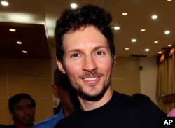 FILE - Telegram founder Pavel Durov smiles following his meeting with Indonesian Communication and Information Minister Rudiantara in Jakarta, Indonesia, Aug. 1, 2017.