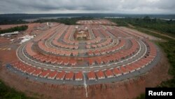 FILE - An overview of the houses being built for employees of the Belo Monte hydroelectric dam, planned to be the world's third largest, in Pimental, near Altamira in Para state.