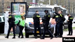 Police secure the site of a shooting in Utrecht, Netherlands, March 18, 2019.