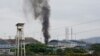 El humo se eleva desde la penitenciaría Litoral en Guayaquil, Ecuador, el lunes 15 de noviembre de 2021. 