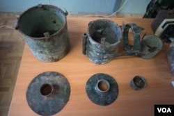 Remnants of defused IEDs on display in an office in the AMISOM base in Mogadishu, Sept. 21, 2016. (Photo: J. Patinkin/VOA)