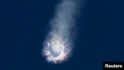 An unmanned SpaceX Falcon 9 rocket explodes after liftoff from Cape Canaveral, Florida, June 28, 2015.