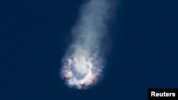 An unmanned SpaceX Falcon 9 rocket explodes after liftoff from Cape Canaveral, Florida, June 28, 2015. The rocket exploded about two minutes after liftoff, destroying a cargo ship bound for the International Space Station.