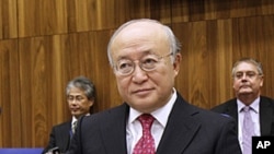 Director General of the International Atomic Energy Agency, IAEA, Yukiya Amano of Japan waits for the start of the IAEA board of governors meeting at the International Center, in Vienna, Austria, Nov. 17, 2011.