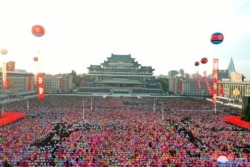 FILE - People gather to commemorate the 75th anniversary of the founding of the ruling Workers' Party of Korea (WPK), at Kim Il Sung Square, Pyongyang, North Korea in this image released by North Korea's Central News Agency on October 10, 2020. (KCNA)