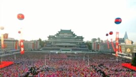FILE - People gather to commemorate the 75th anniversary of the founding of the ruling Workers' Party of Korea (WPK), at Kim Il Sung Square, Pyongyang, North Korea in this image released by North Korea's Central News Agency on October 10, 2020. (KCNA)