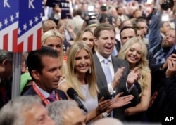 Republican Presidential Candidate Donald Trump's children Donald Trump, Jr., Ivanka Trump, Eric Trump and Tiffany Trump celebrate on the convention floor during the Republican National Convention in Cleveland