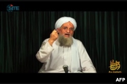 FILE - This still image from video obtained Oct. 26, 2012, courtesy of the Site Intelligence Group, shows al-Qaida leader Ayman al-Zawahiri speaking in a video from an undisclosed location.