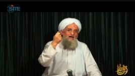 This still image from video obtained Oct. 26, 2012, courtesy of the Site Intelligence Group, shows al-Qaida leader Ayman al-Zawahiri speaking in a video from an undisclosed location.
