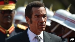 FILE: President Lt Gen. Seretse Khama Ian Khama, right, attends a swearing-in ceremony for a second and final term as Botswana president at the National Assembly buildings in Gaborone, Botswana, Oct. 28 2014.