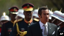 FILE: President Lt Gen. Seretse Khama Ian Khama, right, attends a swearing-in ceremony for a second and final term as Botswana president at the National Assembly buildings in Gaborone, Botswana, Oct. 28 2014.