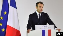 French President Emmanuel Macron gives a speech in the northern port of Calais on Jan. 16, 2018, vowing that France will not allow another migrant camp like the infamous "Jungle" to spring up in the city.