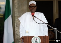FILE - This photo taken on May 14, 2016 shows Nigerian President Muhammadu Buhari speaking during a press conference at the Presidential Palace in Abuja.