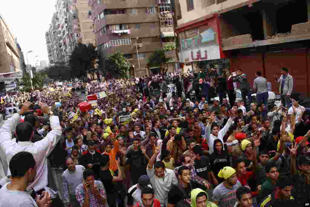 Supporters of Egypt's ousted President Mohamed Morsi hold a rally against a new law regulating protest in Cairo, Nov. 29, 2013. 