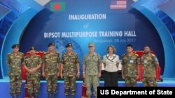 Bangladesh Army Chief General Abu Belal Muhammad Shafiul Huq, U.S. Admiral Harry B. Harris Jr., Ambassador Marcia Bernicat, and Bangladeshi service men attend the Inauguration of the BIPSOT Multipurpose Training Hall in Bangladesh, 08 July, 2017. 