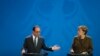 Меркель і Олланд виступають за продовження санкцій проти Росії