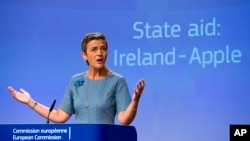 FILE - An Aug. 30, 2016, photo shows European Union Competition Commissioner, Margrethe Vestager, speaking at EU headquarters in Brussels. Vestager, who ruled against Apple in a tax case, said she was "absolutely certain that the decision on Deutsche Bank is built on the facts of the case and American legislation."