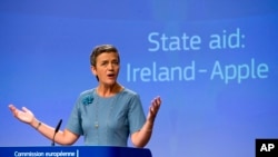 FILE - European Union Competition Commissioner Margrethe Vestager speaks during a media conference at EU headquarters in Brussels on Aug. 30, 2016. 