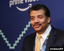 FILE — Astrophysicist Neil deGrasse Tyson attends an event in New York, May 13, 2019.