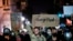 Demonstrators attend a 'Sit Out the Curfew' protest against the death of George Floyd who died on May 25 in Minneapolis while in police custody, along a street in Oakland, California, on June 3, 2020.
