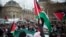 Demonstrators shout as they hold Palestinian flags during a protest against U.S. President Donald Trump's decision to recognize Jerusalem as Israel's capital, at Republique Square in Paris, France, Dec. 9, 2017.