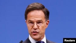 FILE - NATO Secretary-General Mark Rutte talks to reporters at the alliance's headquarters in Brussels, Dec. 4, 2024. 