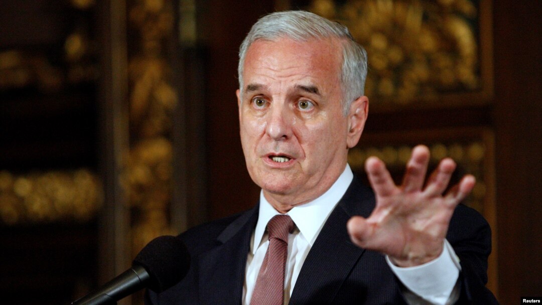 FILE - Minnesota Gov. Mark Dayton speaks to media in St. Paul, Minnesota, July 20, 2011.