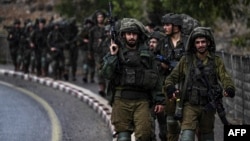 Izraelski vojnici na granici sa Libanom (Foto: Aris MESSINIS-AFP)