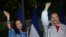 FILE - Nicaragua's incumbent president Daniel Ortega and his wife, vice presidential candidate Rosario Murillo, left, wave at supporters after casting their ballots in Managua, Nov. 6, 2016. 
