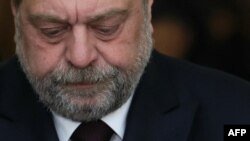 French Justice Minister Eric Dupond-Moretti reacts after a tribunal's not-guilty verdict over alleged conflicts of interest and abuse of office, at a courthouse in Paris, on Nov. 29, 2023.