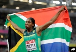In this Sunday, Aug. 13, 2017 file photo South Africa's Caster Semenya celebrates winning the gold in the final of the Women's 800m during the World Athletics Championships in London. (AP Photo/David J. Phillip, File)