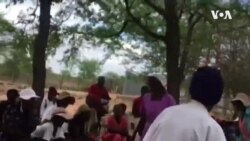 Zimbabwean Chief Dancing During Maize Distribution Event