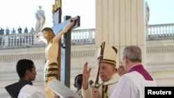 FILE - Pope Francis leads a mass to open the Synod of Bishops in St Peter's Square at the Vatican, October 4, 2023. 