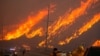 Members of a firefighting unit  enactment    to conflict  the Hughes Fire adjacent   Castaic Lake, northbound  of Santa Clarita, California, Jan. 22, 2025. 