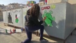 Çend Hunerhezên Urdunî Ser Banên Xanîyan Reng Dikin