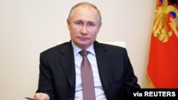 Predsednik Rusije Vladimir Putin u Kremlju, 30. marta 2021. (Foto: Reuters)