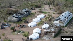 Tents belonging to aid organizations are seen after Cyclone Idai at Guara Guara village outside Beira, Mozambique, March 22, 2019. 