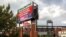 A sign outside the stadium advises that the baseball game between the Philadelphia Phillies and the Washington Nationals has been postponed, July 28, 2021, in Philadelphia. 