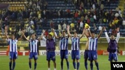 Les joueurs du FC Porto célèbrent leur qualification pour la finale de la Ligue Europa face au Villarreal en 2012 au stade Madrigal, en Espagne.