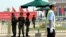 Armed Chinese police stand guard on Tiananmen Square in Beijing, June 3, 2014. 