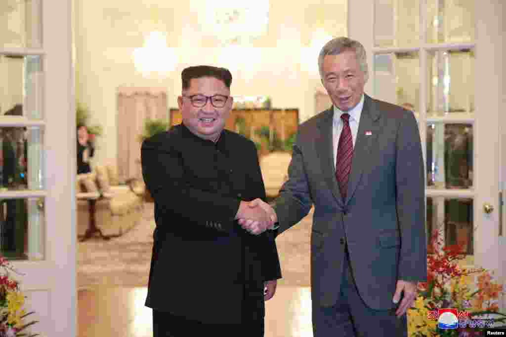 Kim Conq Un baş nazir Li Hsien Loonqla