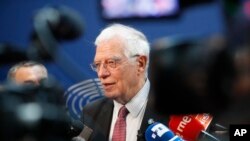 FILE - European Union foreign policy chief Josep Borrell talks to reporters at the European parliament in Strasbourg, eastern France, Jan.14, 2020. 
